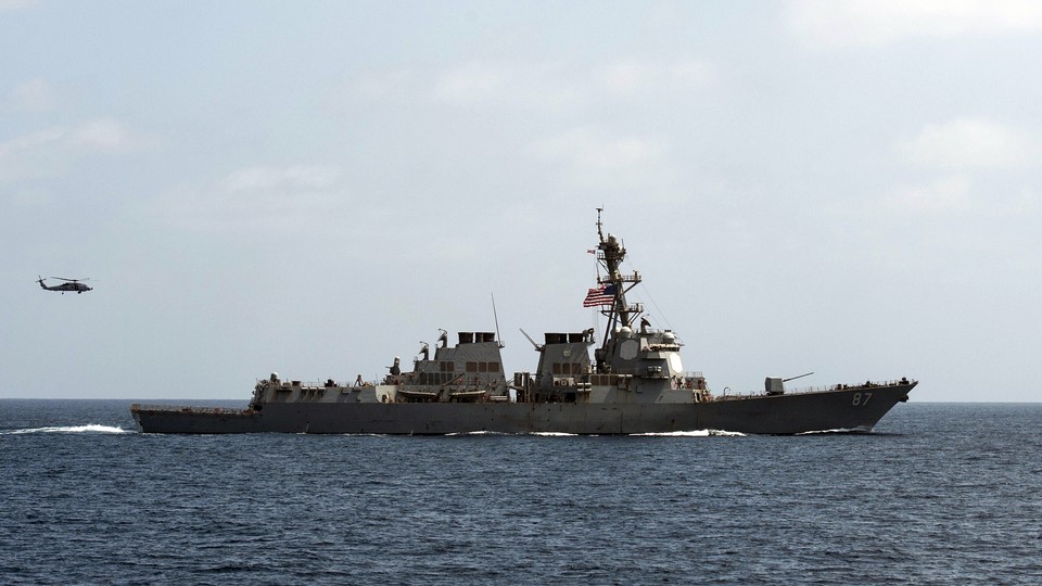 The USS Mason conducts maneuvers as part of a exercise in the Gulf of Oman on September 10, 2016.