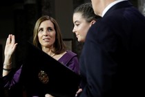 Martha McSally participates in a mock swearing-in during the opening day of the 116th Congress on January 3, 2019.