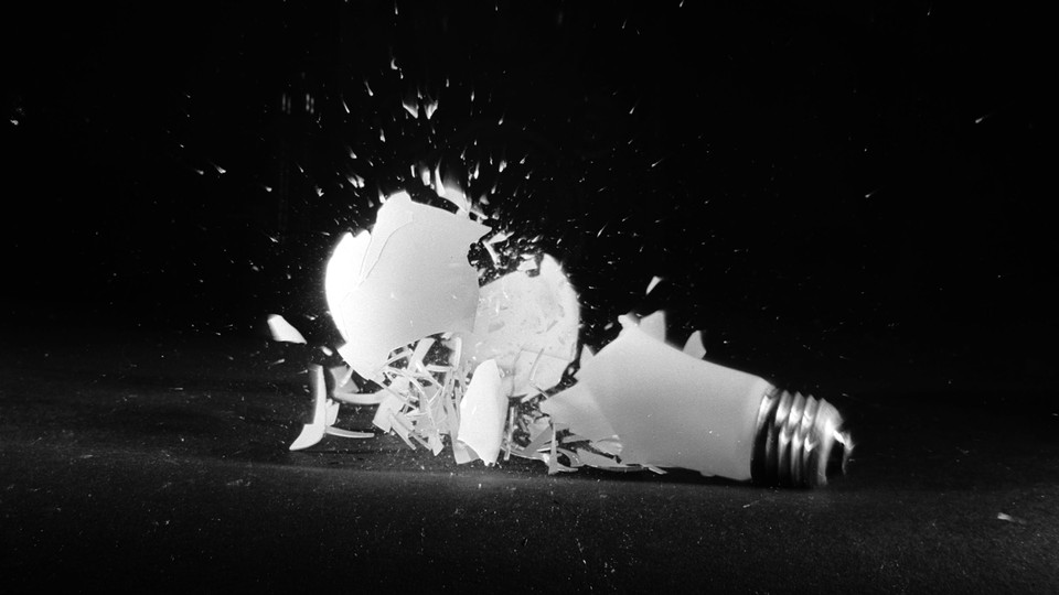 A light bulb shatters.