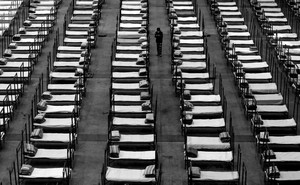 Cots lined up in a room