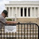 A National Parks worker in front of the blocked-off Lincoln Memorial in Washington, D.C.