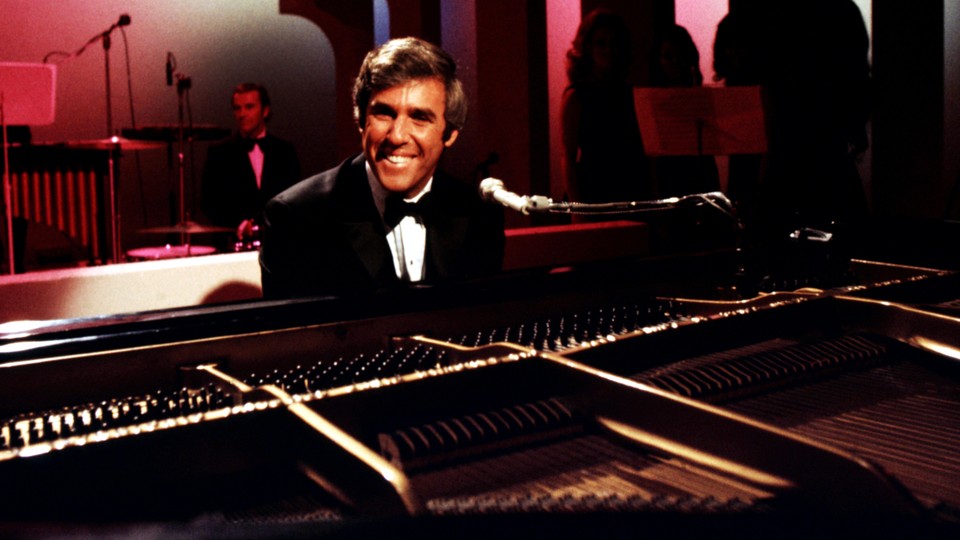 Photo of Burt Bacharach at a piano