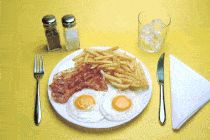 A GIF of a breakfast plate being taken away.