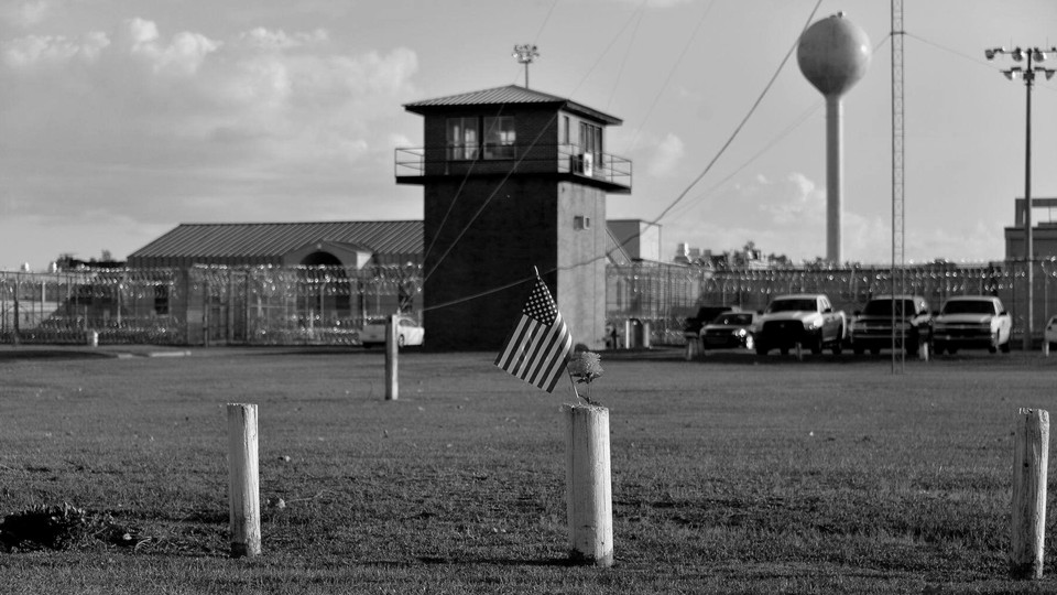 A black and white photograph of Holman Correctional Facility in Alabama