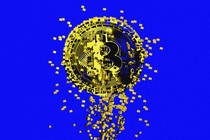 A graphic of a dissolving gold bitcoin on a bright blue background