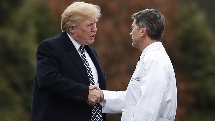 Donald Trump shakes Ronny Jackson's hand