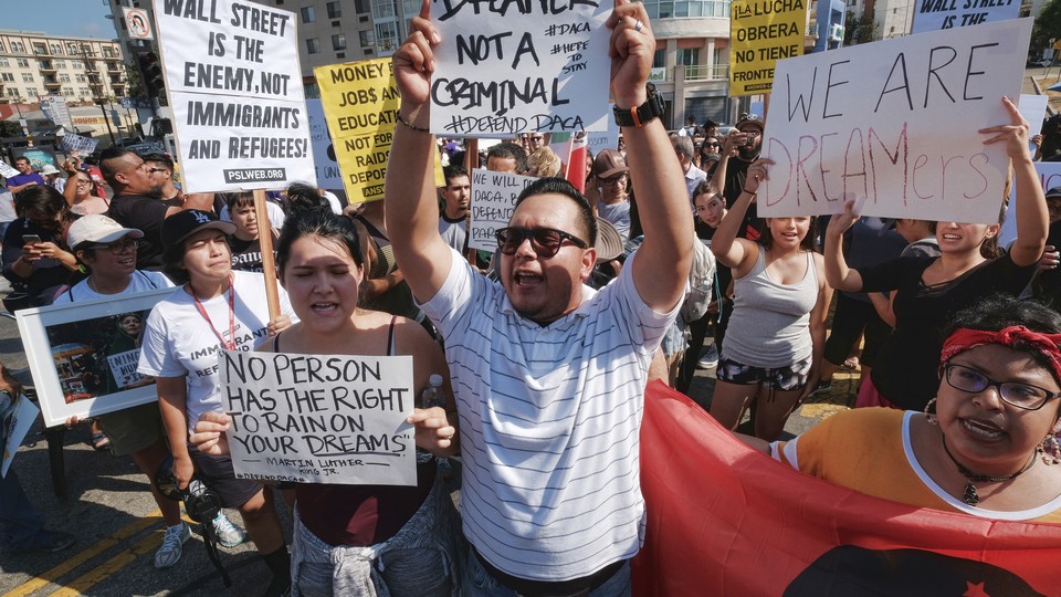 Protesters rally in support of the Deferred Action for Childhood Arrivals, or DACA, during a Labor Day rally in downtown Los Angeles on September 4.