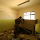 A sniper of the Iraqi rapid response forces takes his position during a battle with Islamic State militants in Mosul, Iraq, on March 7, 2017. 
