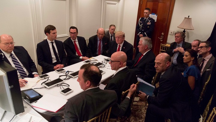 U.S. President Donald Trump is shown in an official White House handout image meeting with his National Security team.