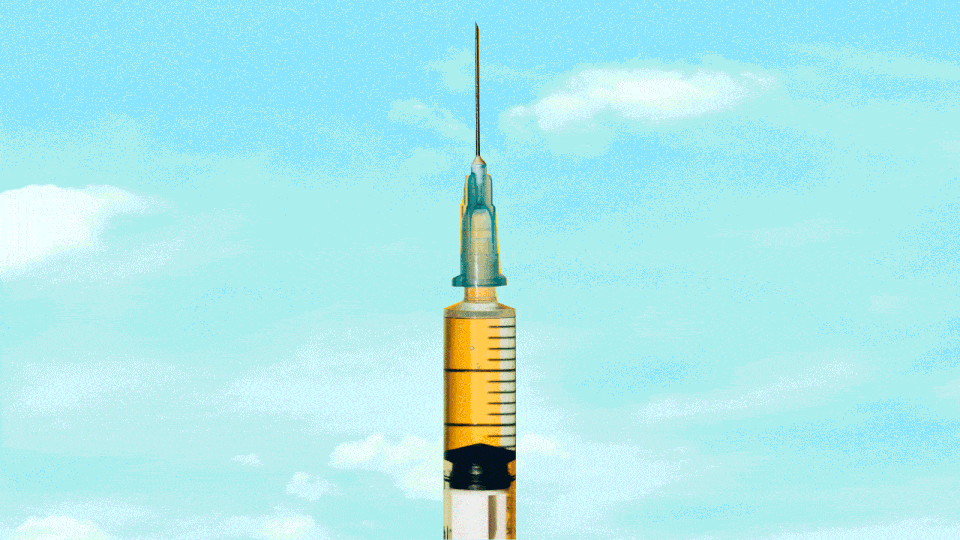 A gif of an amusement-park ride shaped like a vaccine needle