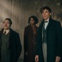 Dan Fogler, Jessica Williams, Eddie Redmayne, and Callum Turner staring uneasily in "Fantastic Beasts: The Secrets of Dumbledore"