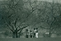 Students walking across Hampshire College's campus in 1977