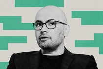 Illustration with a black-and-white photograph of Demis Hassabis with green pixels behind him