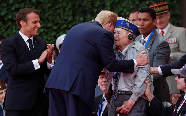 Donald Trump greets a D-Day veteran.