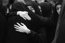 A photo of mourning Iranian women
