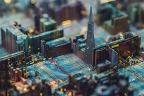 Photo-illustration of a computer chip made to look like the city of San Francisco