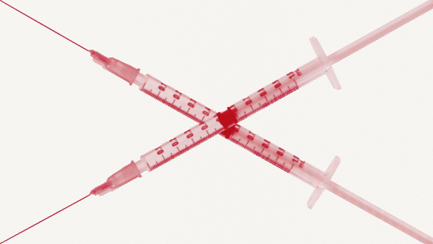 Two syringes crossing each other diagonally