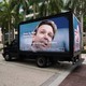 A photo of truck displaying an anti–Ron DeSantis ad