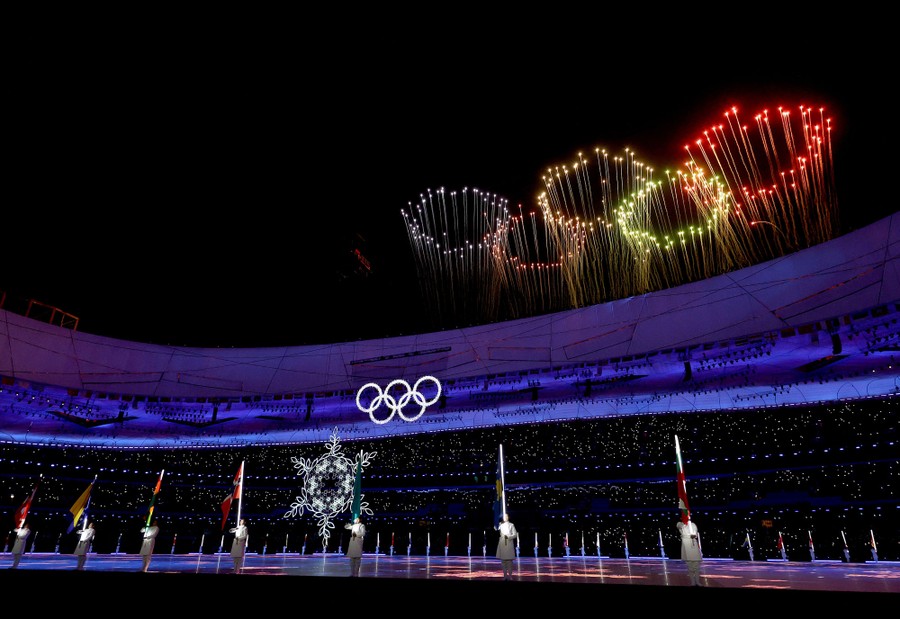 A fireworks display is seen from inside a stadium.