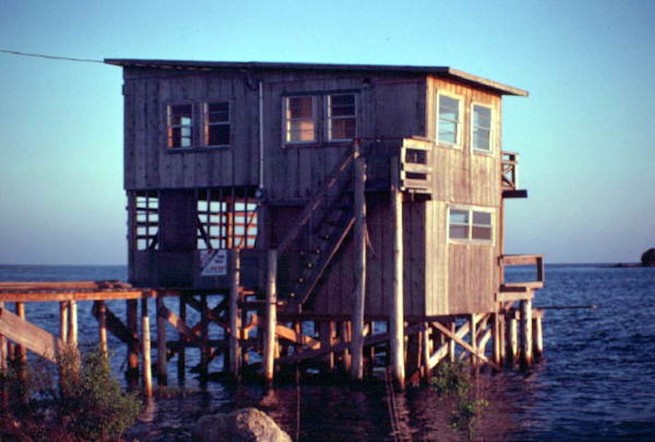 house on stilts over the water