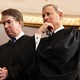 Photograph of several Supreme Court justices, with Kavanaugh and Roberts in the foreground.