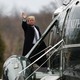 President Trump, waving, boards Marine One.