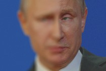 A half-blurred photo of Vladimir Putin