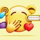 An illustration of an emoji with many different features surrounding it—a heart, imp horns, and a grimacing mouth