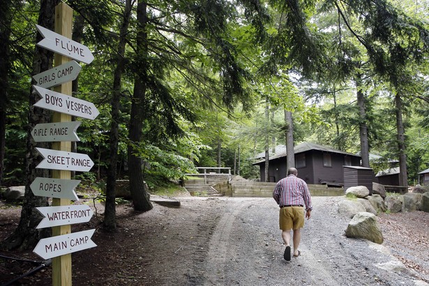 A man walks through the woods