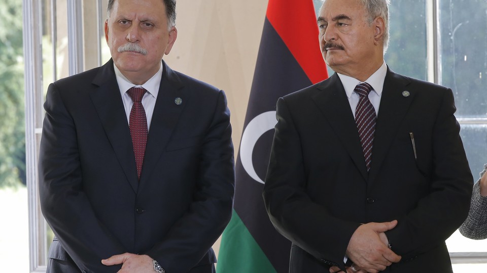 Libyan Prime Minister Fayez al-Sarraj and General Khalifa Haftar declare a ceasefire on July 25, 2017. 
