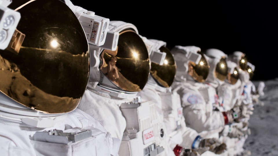 Astronauts standing in an orderly line