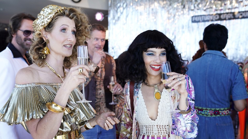 Renata (Laura Dern) and Bonnie (Zoë Kravitz) at a party for Amabella in 'She Knows'