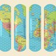 An illustration of a world map as Band-Aids