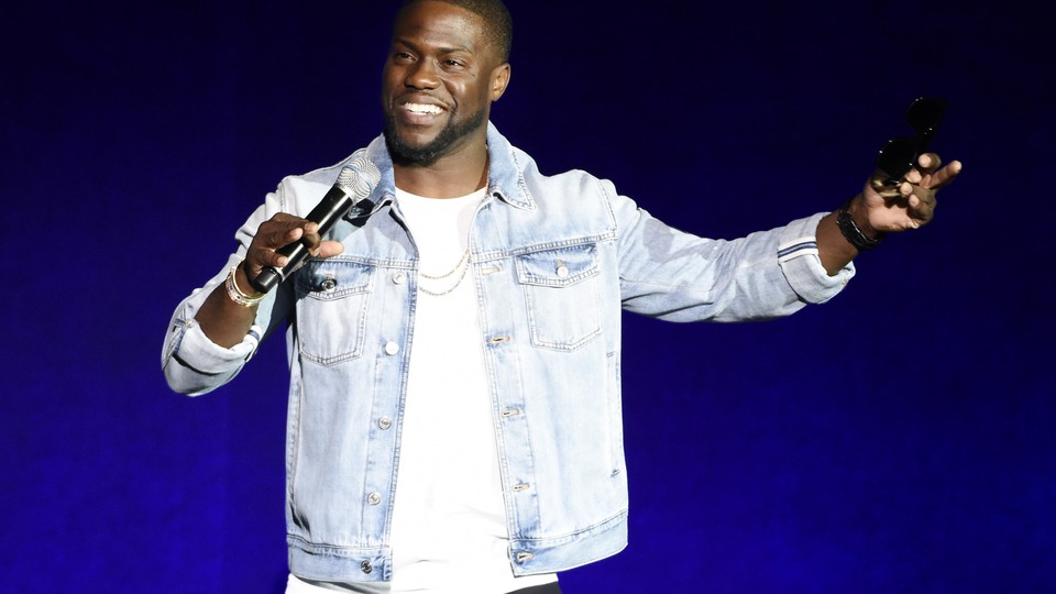 Kevin Hart performs during a comedy show.