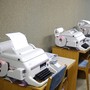 A row of fax machines