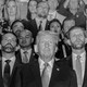 A black-and-white photo of Donald Trump and entourage at the RNC
