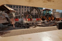 Photo of construction crew destroying the road with the Black Lives Matter mural