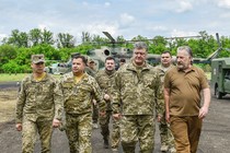 Ukrainian President Petro Poroshenko meets with servicemen during his visit to Donetsk region, Ukraine on June 14, 2017. 