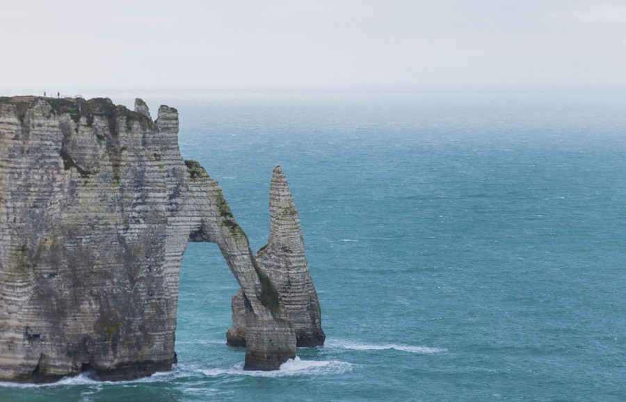 An arch formation is seen in chalk sea cliffs.