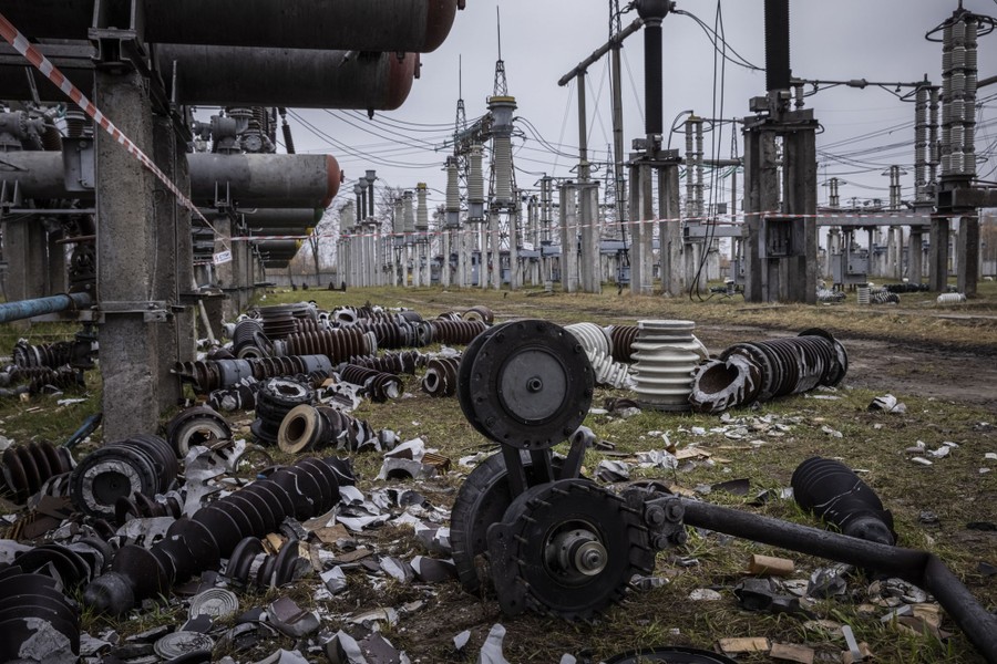 Wreckage lies on the ground in a power substation.