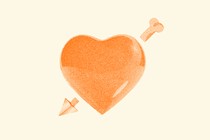 An orange heart with an arrow through it