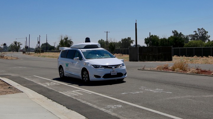 A self-driving Waymo vehicle at the company's test city on the former Castle Air Force Base