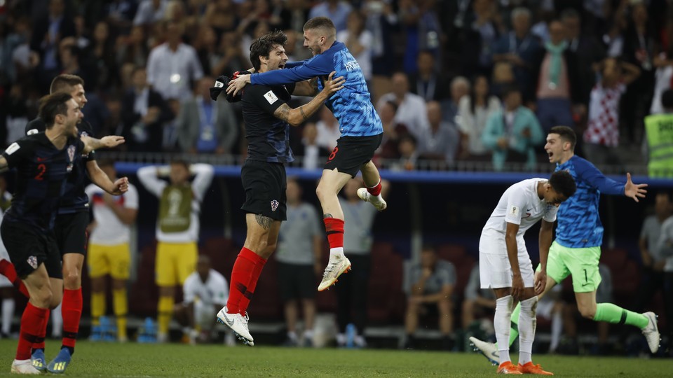 Players from the Croatia team celebrate after the semifinal match between Croatia and England at the 2018 soccer World Cup