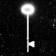 a key glows in the starry darkness