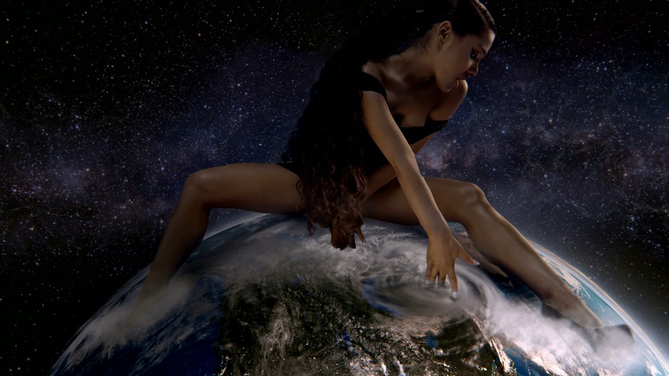 Ariana Grande sits astride the world for 'God Is a Woman'