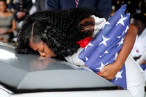 Myeshia Johnson kisses the casket of her husband, Sergeant La David Johnson.