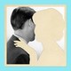 A black-and-white image of a man with an empty space where a woman might be hugging him