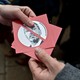 Anti-Kickl demonstrators hand out stickers with his face on them at a rally in Vienna in December 2018.
