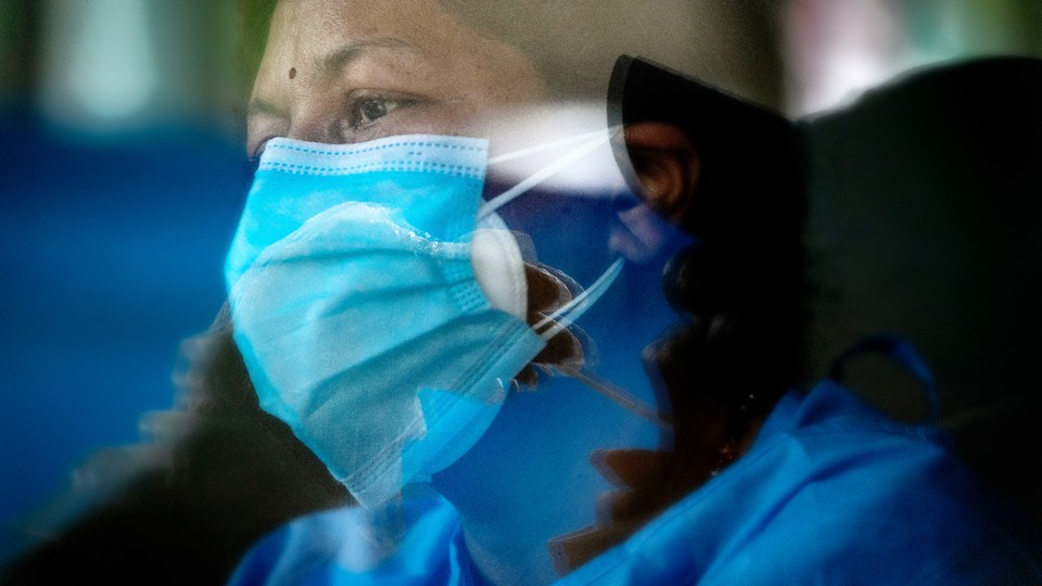 Close-up photo of a medical professional wearing a mask