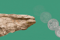 a quarter falling off a cliff